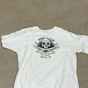 White and black graphic t-shirt with skull‎ and swords design Venice Florida